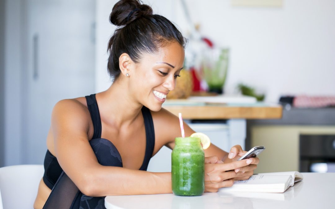 woman drinking a smoothie